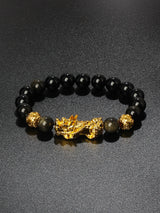 Feng Shui Obsidian Pixiu money bracelet for financial attraction, grounding, and protective bracelet use.