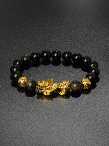 Feng Shui Obsidian Pixiu money bracelet for financial attraction, grounding, and protective bracelet use.