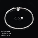 Fine silver rope chain bracelet in 4MM width for layering, gift giving, and elegant everyday wear.