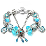 BAOPON floral charm bracelet with butterfly and pansy motifs for jewelry gifting, outfit enhancement, and personal accessory use.