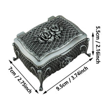 Floral vintage metal jewelry box for organizing small accessories, trinkets, and everyday jewelry storage.