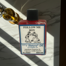 Follow Me Boy Wish Oil dressing oil bottle for candle work, attraction rituals, and spiritual use.