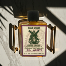 Four Winds Wish Oil bottle for candle dressing, wish work, and ceremonial ritual use.
