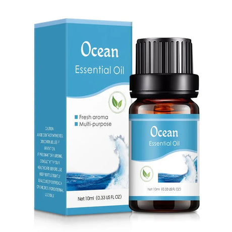 Ocean essential oil bottle and packaging on a white background