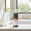 Frankincense & Myrrh essential oil bottle for aromatherapy, relaxation, and daily wellness use.