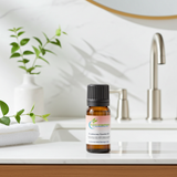 Frankincense essential oil bottle for aromatherapy, meditation, and creating a peaceful home atmosphere.