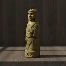Freyja volcanic stone statue, side view