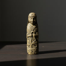 Frigg volcanic stone statue, front view