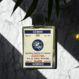 Gemini Wish Oil ritual oil bottle for Gemini zodiac work, petition rituals, and focused intention practice.