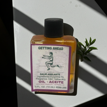 Getting Ahead Wish Oil manifestation oil bottle for focusing desires, spiritual work, and wish rituals.