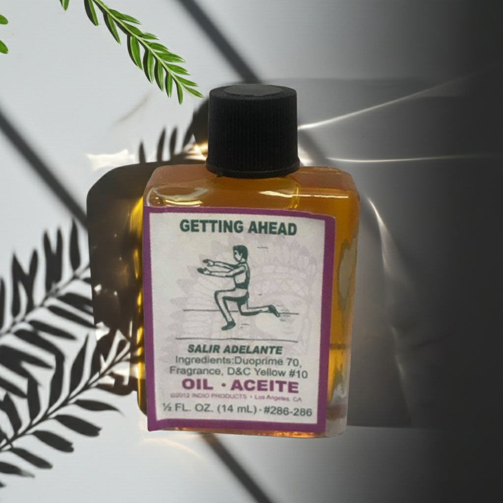 Getting Ahead Wish Oil ritual oil bottle for candle dressing, manifestation, and altar work.