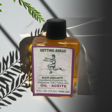 Getting Ahead Wish Oil ritual oil bottle for candle dressing, manifestation, and altar work.