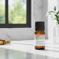 Ginger Essential Oil bottle for warming aromatherapy, spiced diffuser blends, and invigorating morning wellness routines.
