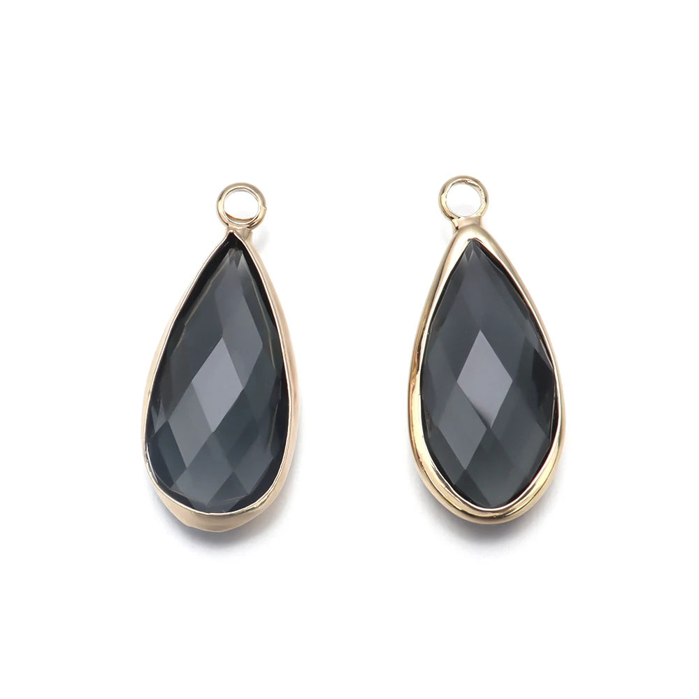 Glass teardrop pendants for jewelry crafts, bracelet accents, and custom accessory making.