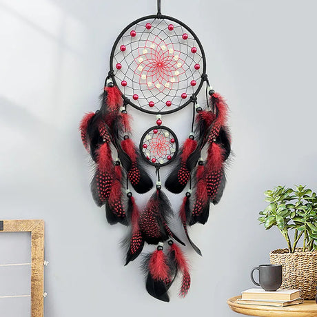 Luminous dream catcher wall hanging with colorful feathers for nursery decor, boho room styling, and soothing nighttime ambiance.