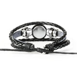 Glowing Zodiac Sign Leather Wrap Bracelet with charm detailing for layering with jewelry and astrology fashion wear.