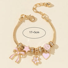 Gold butterfly heart rhinestone beaded bracelet for dressing up wrist stacks, date night looks, and trendy accessory wear.