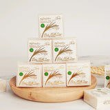 Gold JAM Thai Rice Milk Soap multiple boxes on wooden tray for brightening and daily cleansing.
