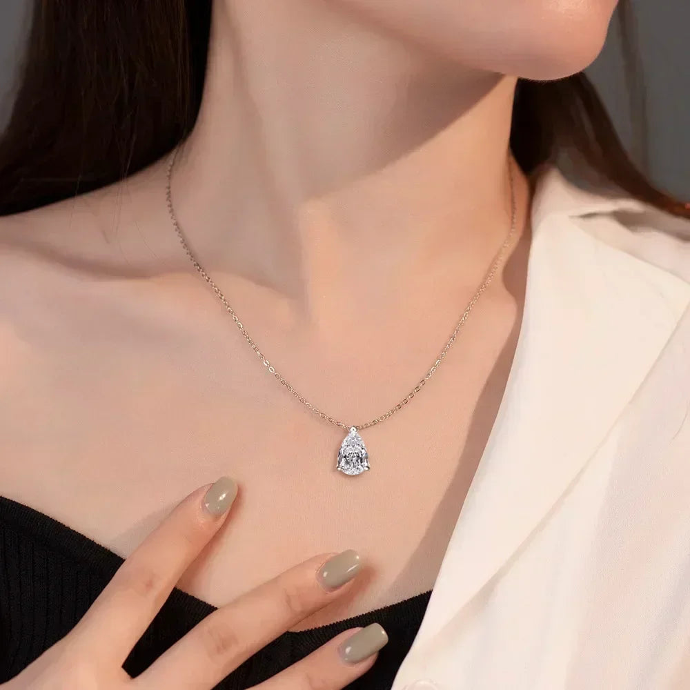Pear-Cut Moissanite Pendant in sterling silver with a pear-shaped stone for anniversary gifting, party wear, and classic jewelry styling.