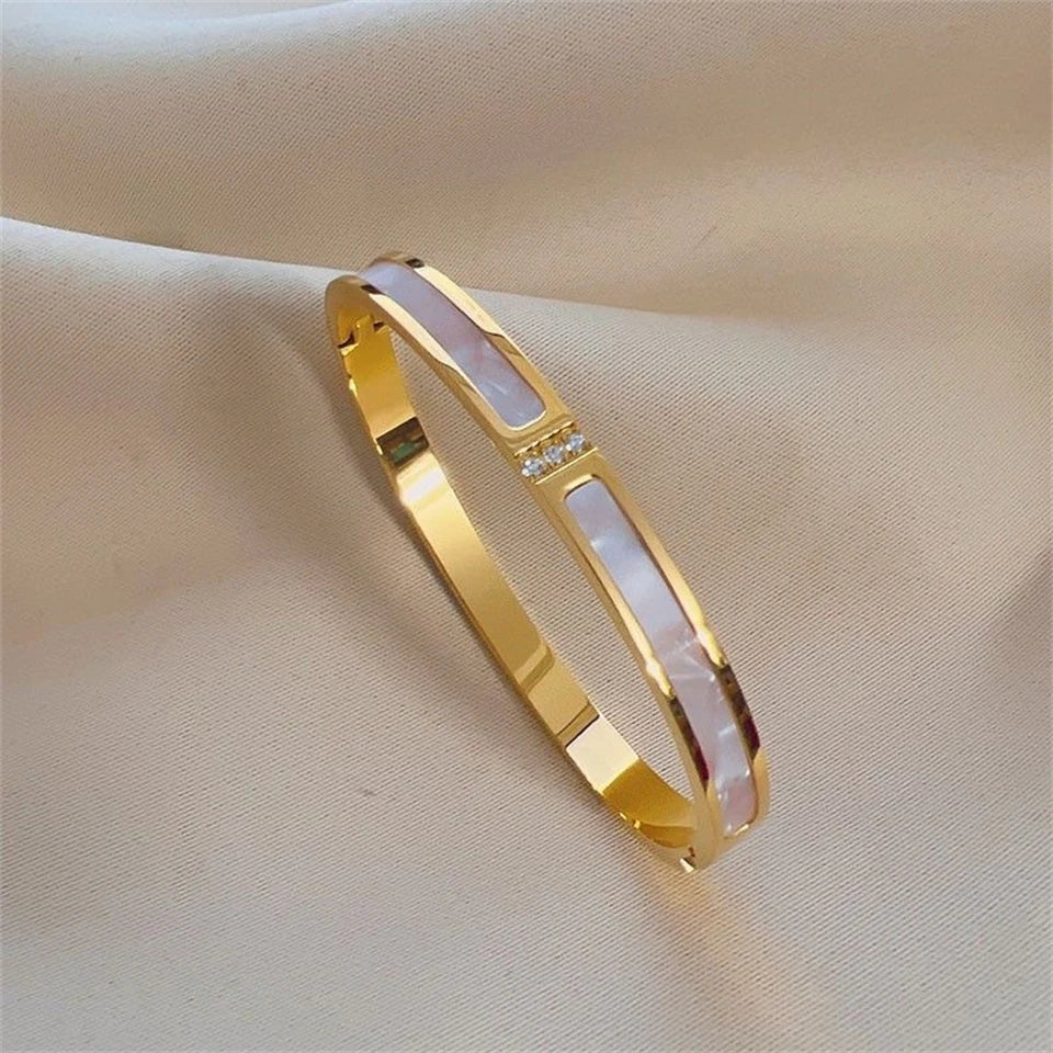 Gold Shell bracelet open cuff with CZ stones for refined wrist styling, occasion dressing, and gift-ready jewelry wear.