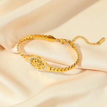 Gold Tree of Life bracelet for women as fashion jewelry for everyday style, office wear, and special occasion accessorizing.