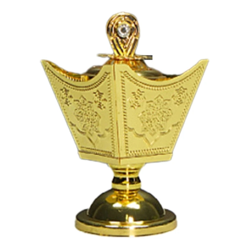 Golden Arabian metal incense burner for bakhoor burning, fragrance rituals, and spiritual practice.