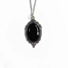 Gothic Red & Black Quartz cameo pendant charm for alternative fashion looks, elegant accessorizing, and evening wear.