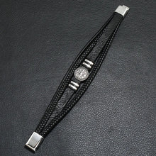 Gothic red black leather cuff bracelet for alternative fashion, nightlife outfits, and punk-inspired wardrobe styling.
