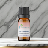 Grapefruit essential oil bottle for massage oil blending, aromatherapy, and self-care routines.