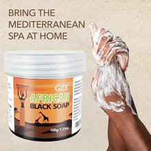 GZE African Black Soap 3-in-1 Cleanser hand applying soap lather on beige background showing texture.