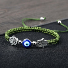 Hand of Fatima Evil Eye charm bracelet with red rope for spiritual protection, charm wear, and symbolic fashion use.