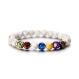 Handmade 7 chakra natural stone bracelet for chakra balancing, yoga wear, and spiritual grounding.