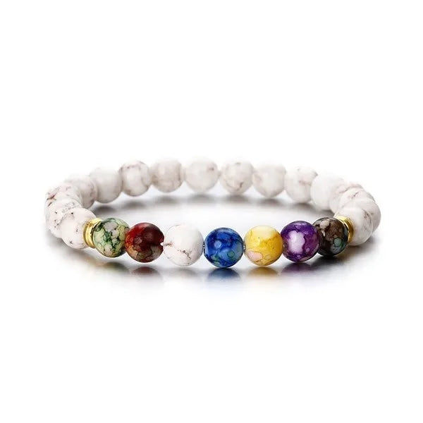 Handmade 7 chakra natural stone bracelet for chakra balancing, yoga wear, and spiritual grounding.