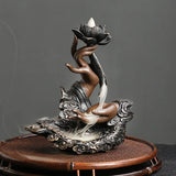 Handmade backflow incense burner in Buddha lotus style for spiritual decor, mindfulness routines, and incense cone use.