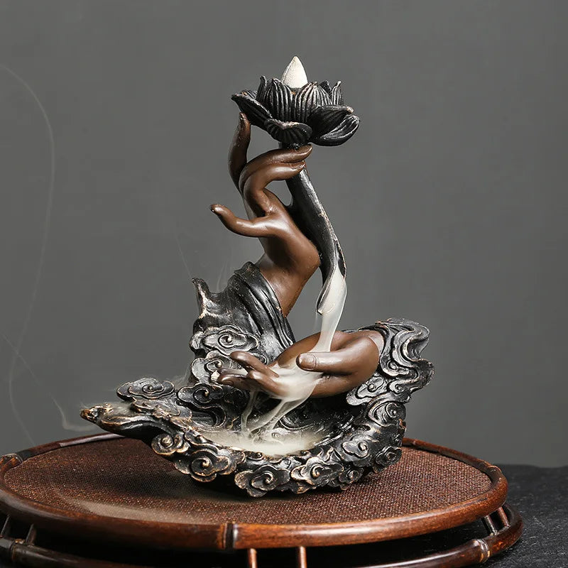 Handmade backflow incense burner in Buddha lotus style for spiritual decor, mindfulness routines, and incense cone use.