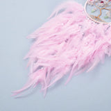 Handmade pink Tree of Life dream catcher wall hanging for bohemian decor, restful bedroom styling, and gift giving.
