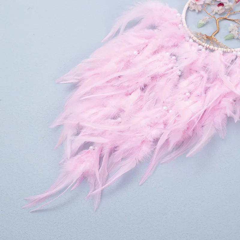 Handmade pink Tree of Life dream catcher wall hanging for bohemian decor, restful bedroom styling, and gift giving.