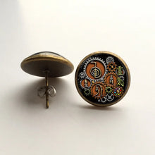 Handmade steampunk Reiki pendant with glass cabochon for healing-inspired jewelry wear, meditation practice, and unique gifting.