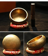 Handmade Tibetan singing bowl set with striker and cushion for meditation, calming rituals, and stress relief.