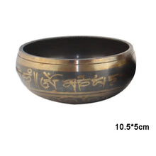 Handmade Tibetan Singing Bowl Set with metal bowl, wooden striker, and cushion for spiritual practice, meditation, and grounding exercises.