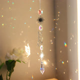 Hanging crystal dream catcher wind chime sun catcher ornament for window display, light reflection, and boho room decoration.