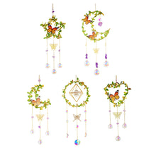 Hanging Crystal Prism Rainbow Maker chime with faceted crystal pieces for sun-catching decor, rainbow light effects, and window or garden use.
