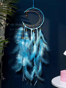 Hanging Moon Dream Catcher feather decor for window display, bohemian home accent, and relaxing room decoration.