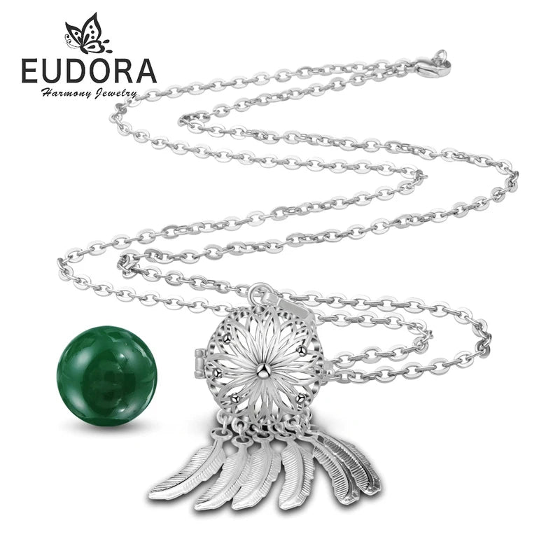 Harmony Bola Dreamcatcher necklace charm pendant for layering with chains, casual wear, and spiritual-themed accessorizing.