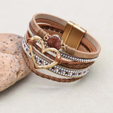 Heart charm leather bracelet boho jewelry piece for casual fashion, bracelet layering, and everyday accessory styling.