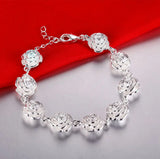 925 Sterling Silver Heart Link Bracelet for women as a silver bracelet for date night wear, layering, and jewelry gifting.