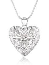 Heart-shaped silver photo frame necklace pendant for displaying a tiny photo and romantic everyday styling.