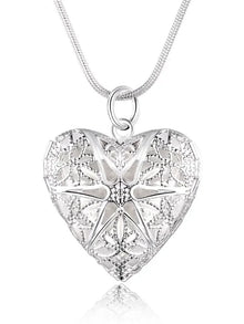 Heart-shaped silver photo frame necklace pendant for displaying a tiny photo and romantic everyday styling.