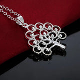 Heart shaped Tree of Life sterling silver pendant for fashion wear, anniversary gifting, and symbolic jewelry use.