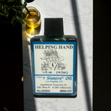 Helping Hand Wish Oil ritual oil bottle for altar work, spiritual petitions, and wish-focused rituals.